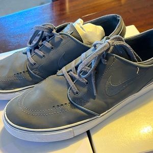 Men’s size 12, gray shoes.